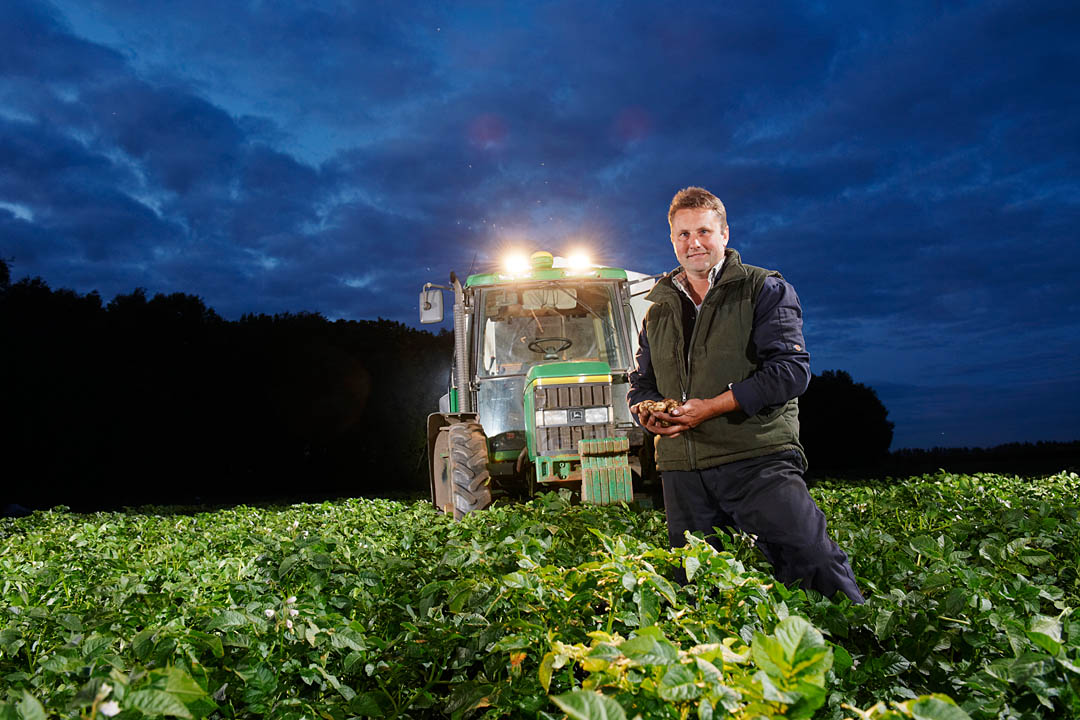 Commercial Photographer, Potato harvest, tractor in field, night, farmer portrait, farming, UK