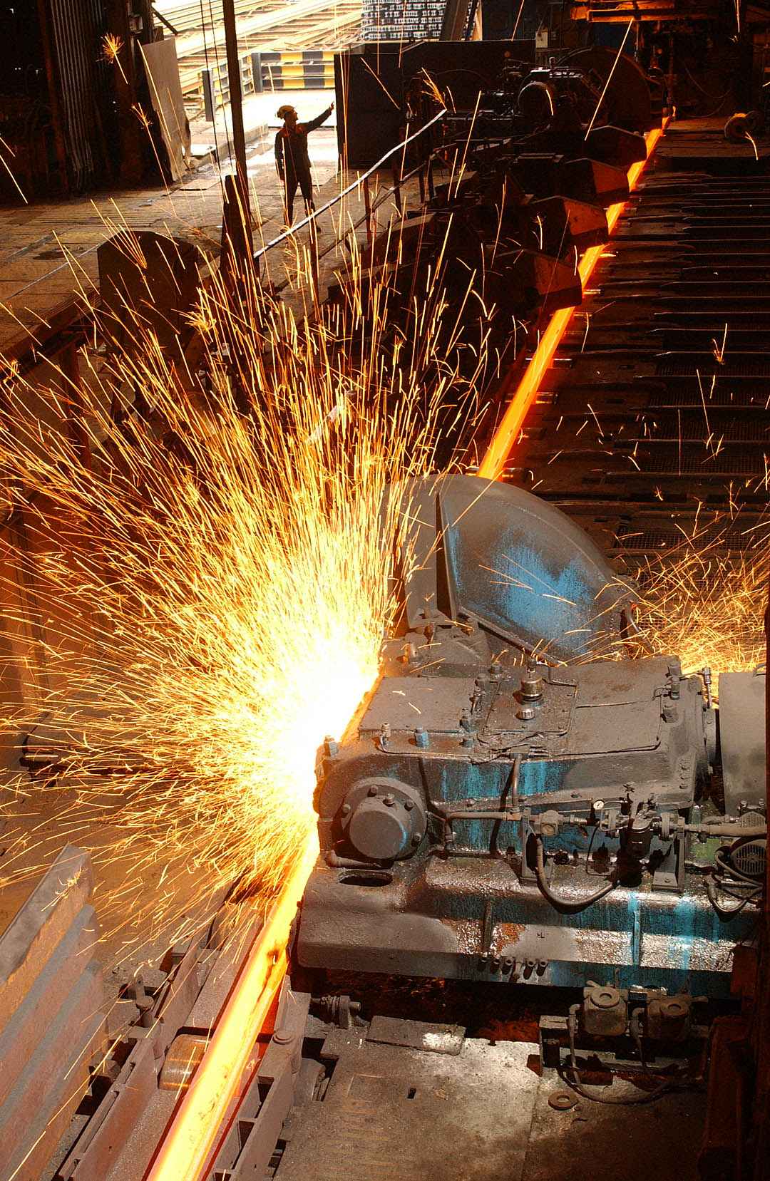 Commercial Photographer: Steel Manufacture, Railway Rails, Cutting line, Workington, England, UK